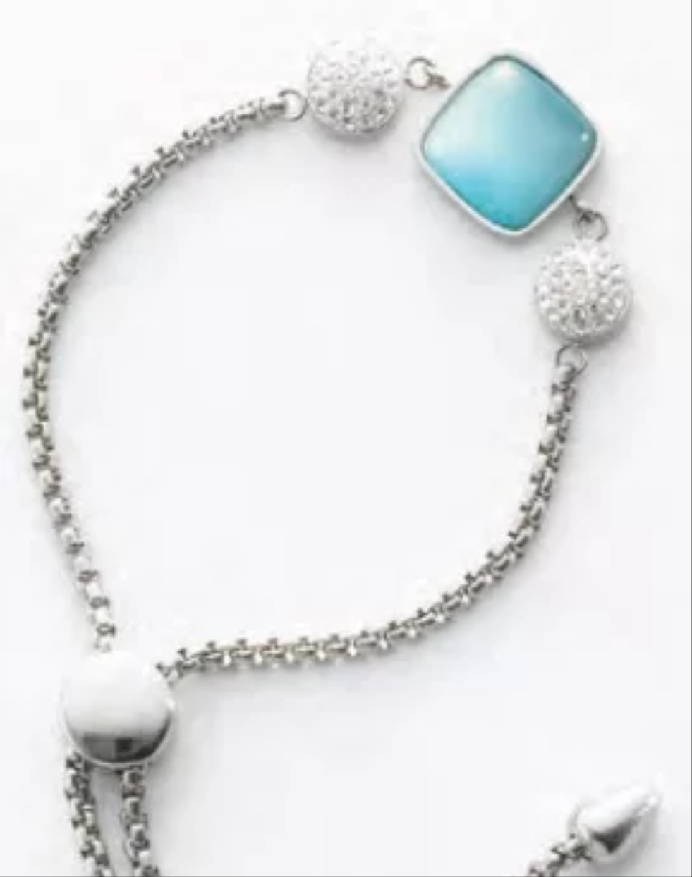 Bracelet argenté bleu et pierre blanche
