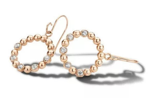 Boucles d'oreilles créoles en or rose