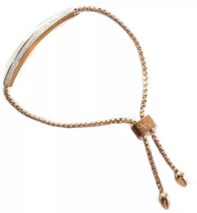 Bracelet couleur or rose avec pierres blanches