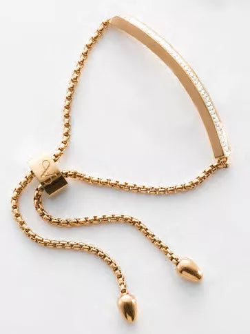 Bracelet couleur or rose avec pierres blanches