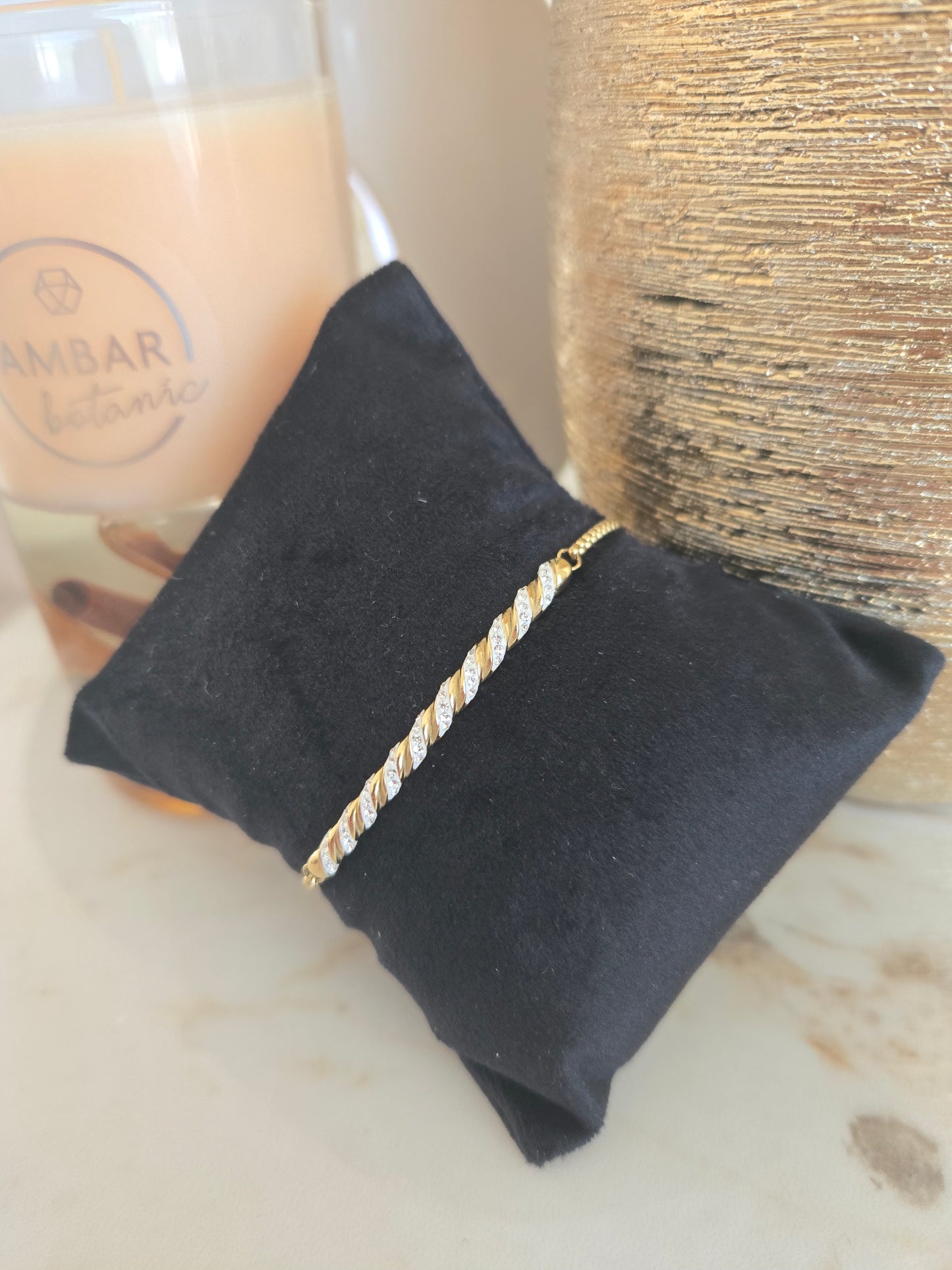 Bracelet couleur or avec pierres blanches