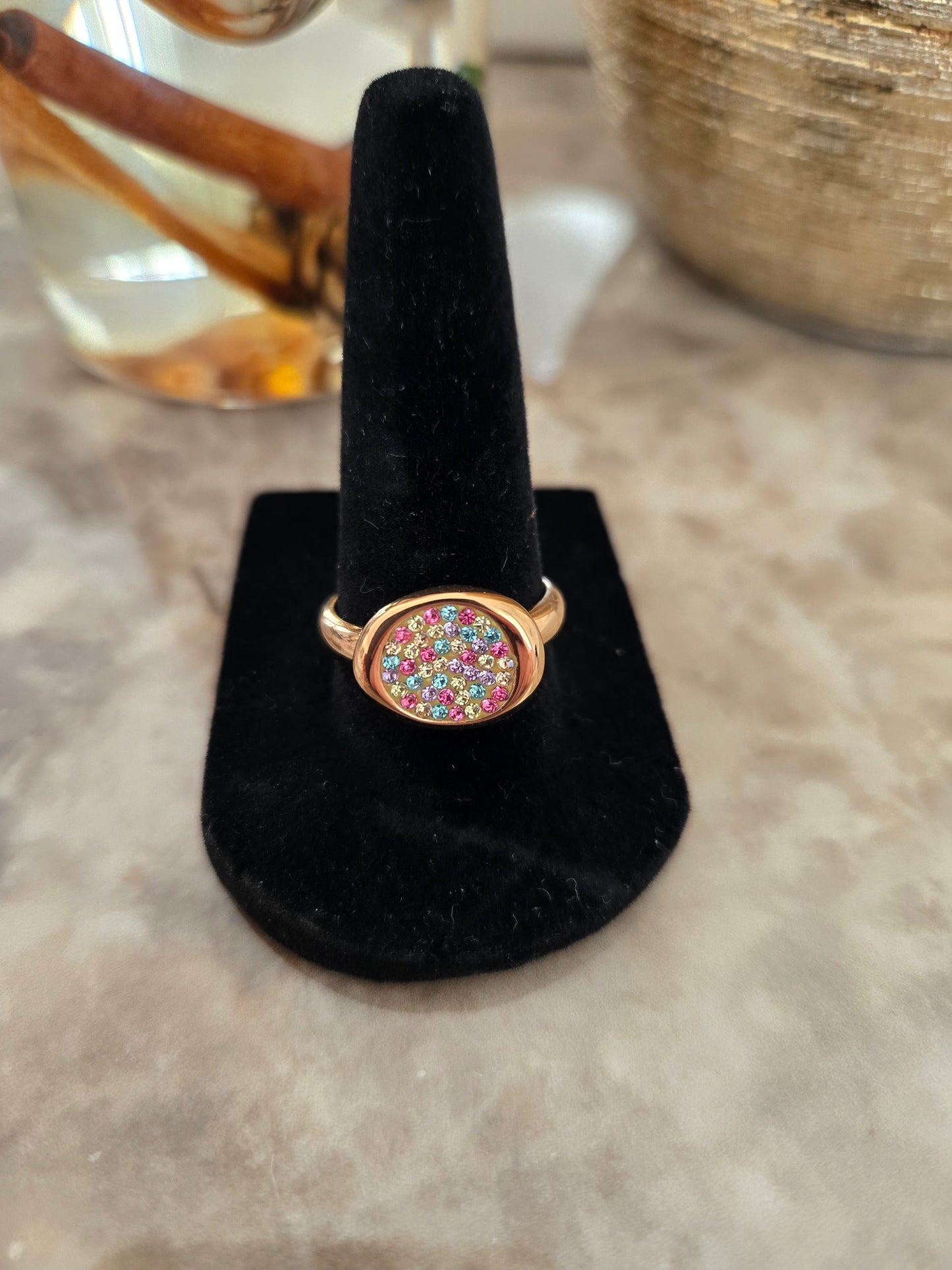 Bague en or rose et pierres précieuses