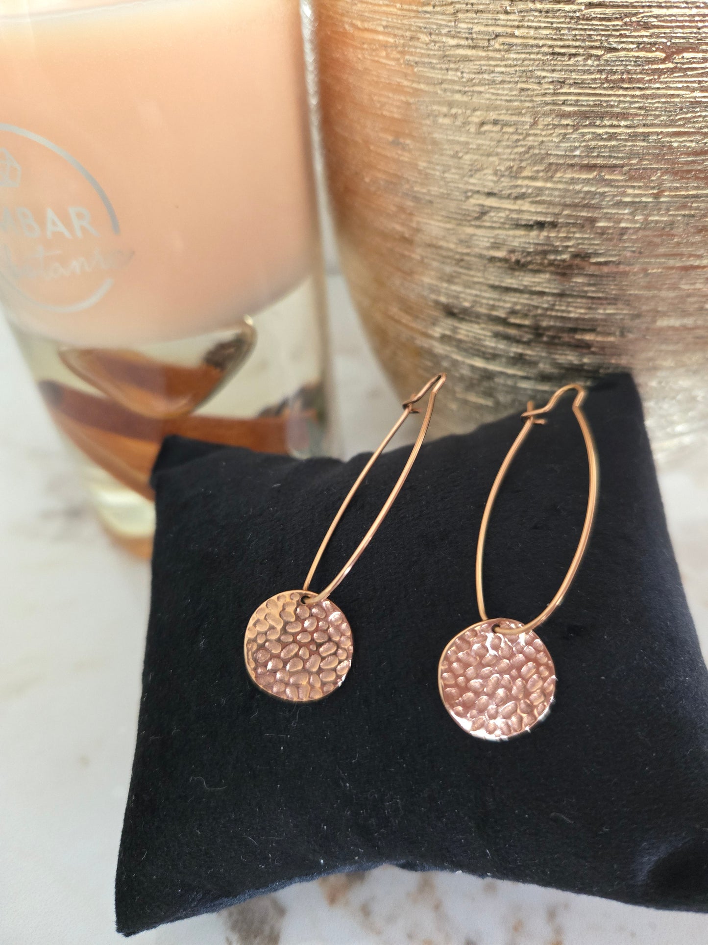 Boucle d'oreille couleur or rose