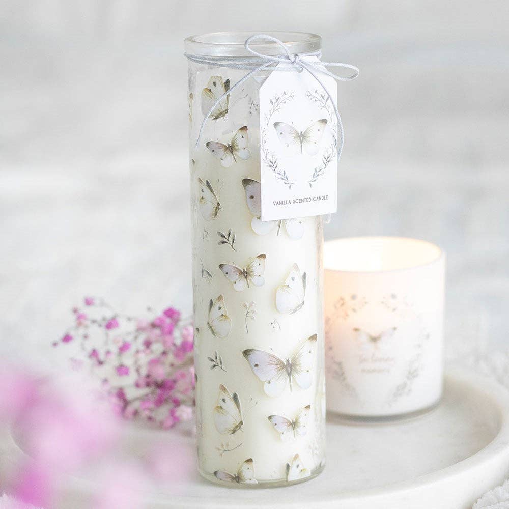 Bougie tube vanille imprimée d'un papillon blanc