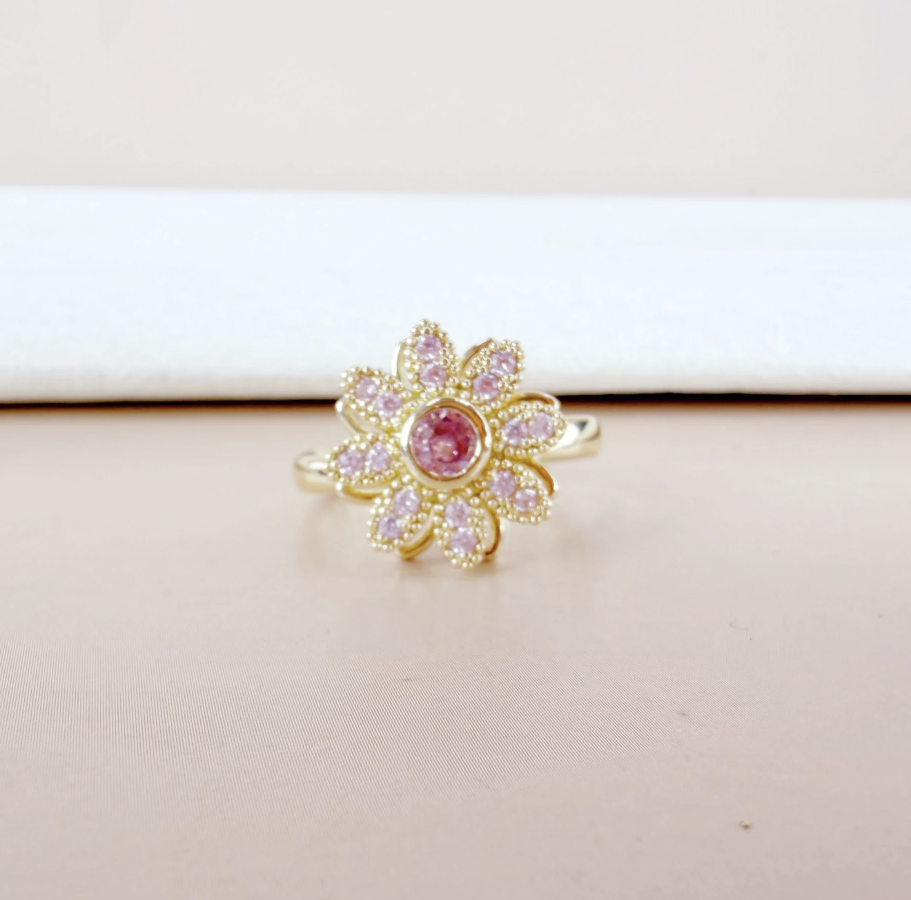 Bague anti-stress soleil rose strass