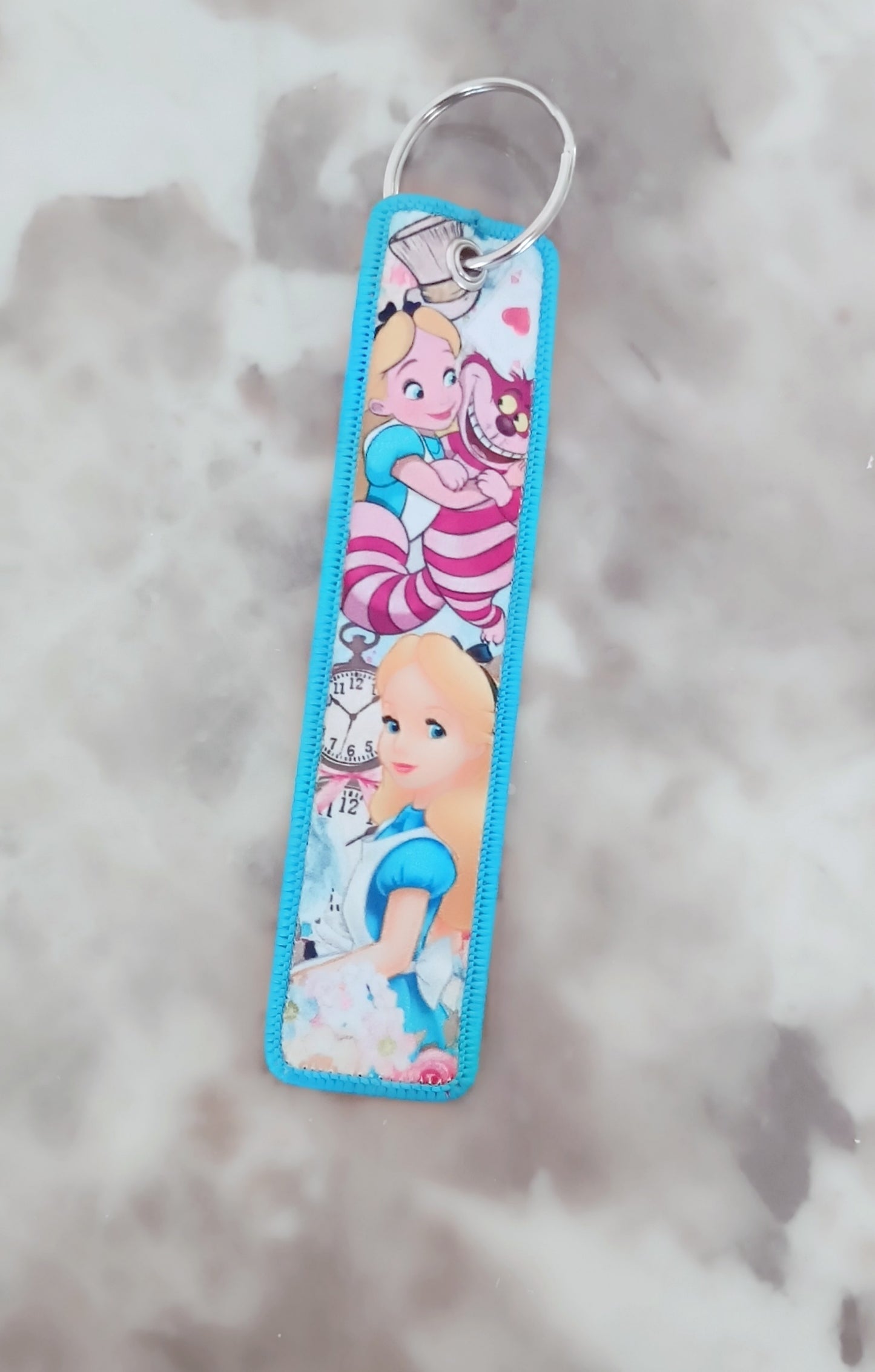 Porte-clé Alice aux pays des merveilles