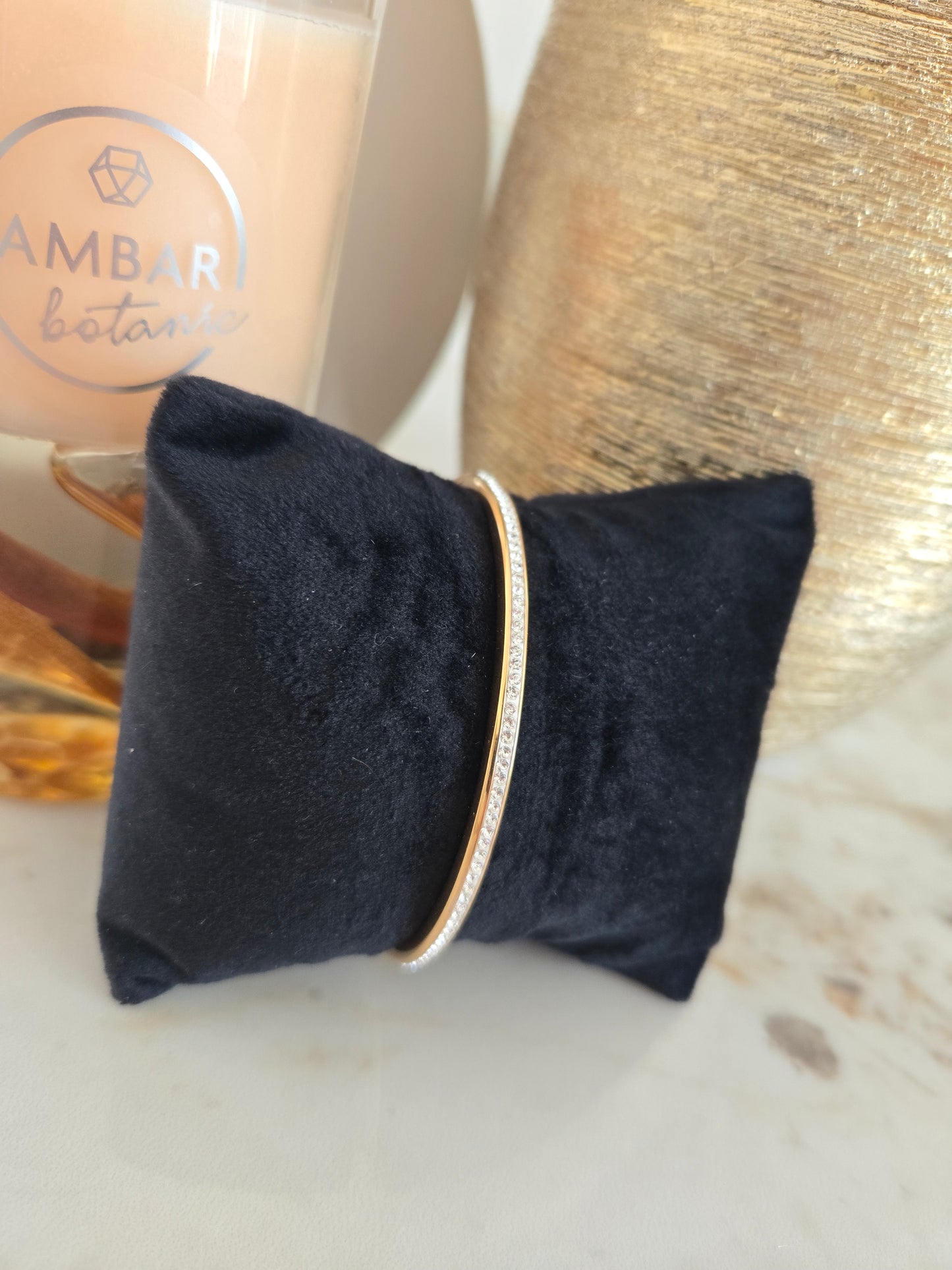 Bracelet couleur or rose avec pierres blanches