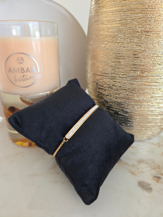 Bracelet couleur or rose avec pierres blanches
