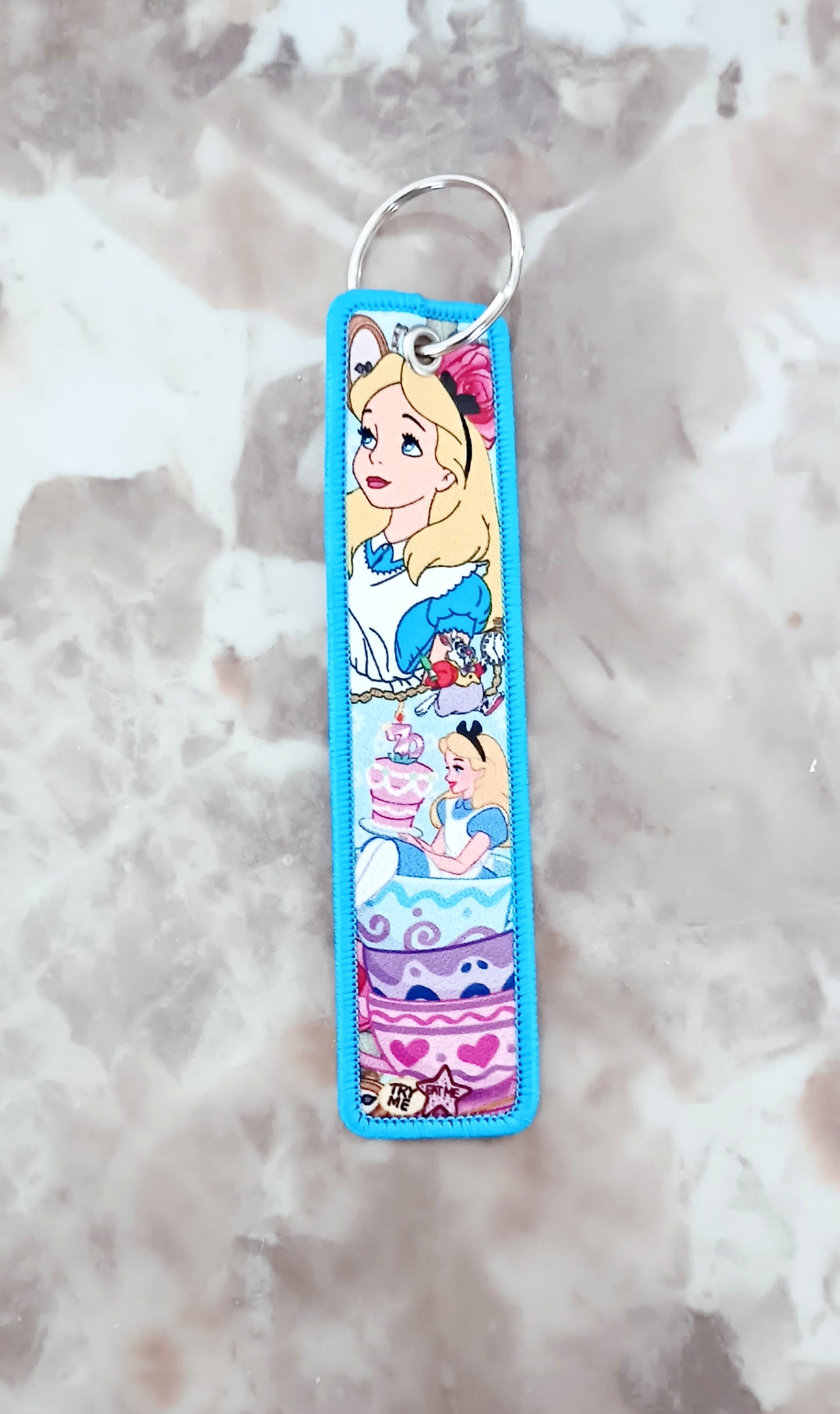 Porte-clé Alice aux pays des merveilles